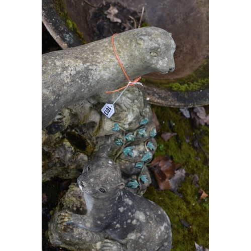 1013 - A MODERN COMPOSITE GARDEN WATER FEATURE in the form of a rockpool with two otters seated height 55cm
