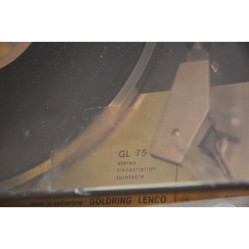 1056 - A GOLDRING LENCO GL75 TRANSCRIPTION TURNTABLE with Shure M55E cartridge, smoked plexiglass lid and o... 