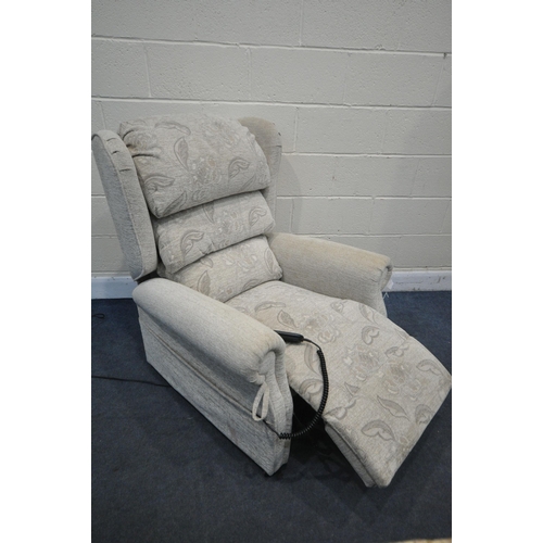 1302 - A REPOSE BEIGE AND FLORAL UPHOLSTERED ELECTRIC RISE AND RECLINE ARMCHAIR (PAT pass and working)