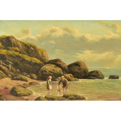 302 - A LATE 19TH CENTURY COASTAL LANDSCAPE WITH FIGURES, two small children are playing with a pond yacht... 