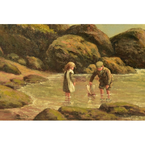 302 - A LATE 19TH CENTURY COASTAL LANDSCAPE WITH FIGURES, two small children are playing with a pond yacht... 