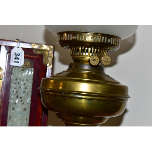 341 - A CHINESE JEWELLERY BOX AND A BRASS BODIED OIL LAMP, the wooden jewellery box having brass handles a... 