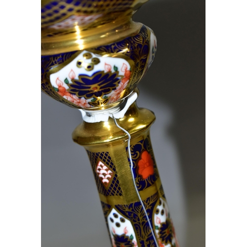 360 - A PAIR OF ROYAL CROWN DERBY 1128 'SOLID GOLD BAND' CANDLESTICKS, of tapering form, the octagonal bas... 