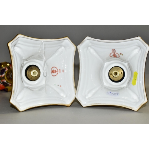 360 - A PAIR OF ROYAL CROWN DERBY 1128 'SOLID GOLD BAND' CANDLESTICKS, of tapering form, the octagonal bas... 