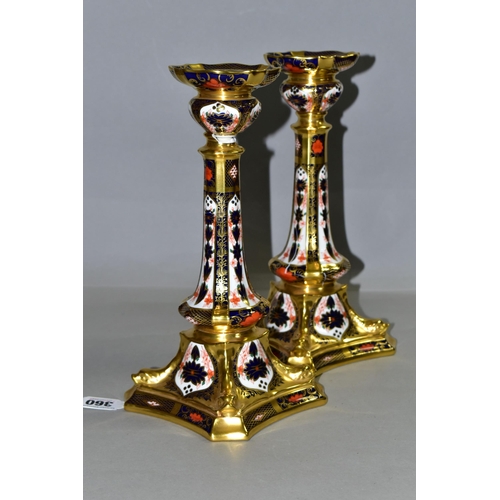 360 - A PAIR OF ROYAL CROWN DERBY 1128 'SOLID GOLD BAND' CANDLESTICKS, of tapering form, the octagonal bas... 