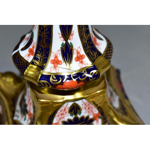 360 - A PAIR OF ROYAL CROWN DERBY 1128 'SOLID GOLD BAND' CANDLESTICKS, of tapering form, the octagonal bas... 