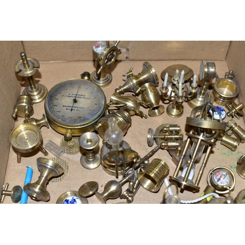 381 - ONE BOX OF MINIATURE BRASS ORNAMENTS, (doll's house pieces) to include oil lamps, roulette wheel, po... 