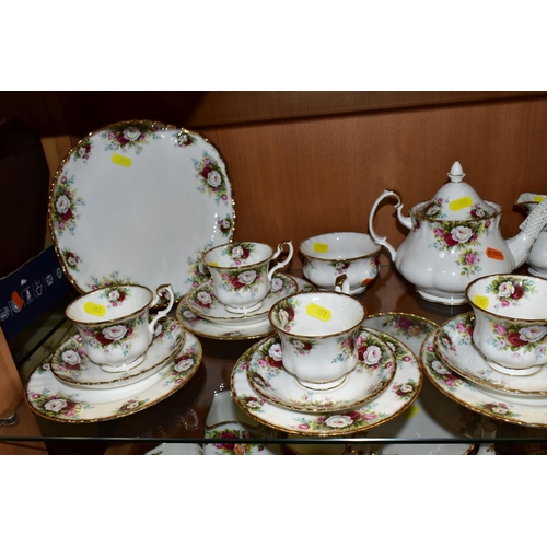 382 - A ROYAL ALBERT 'CELEBRATION' PATTERN TEA SET, comprising two cake plates (one marked as second quali... 