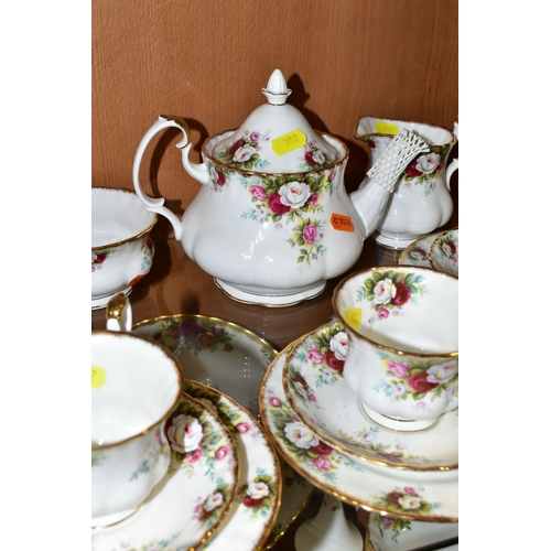 382 - A ROYAL ALBERT 'CELEBRATION' PATTERN TEA SET, comprising two cake plates (one marked as second quali... 