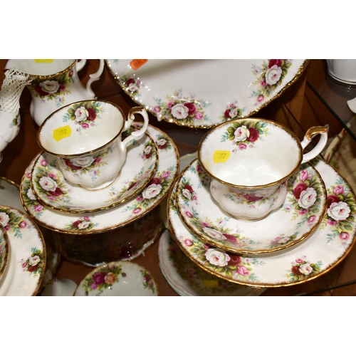 382 - A ROYAL ALBERT 'CELEBRATION' PATTERN TEA SET, comprising two cake plates (one marked as second quali... 