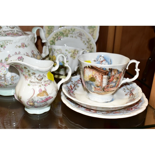 384 - A ROYAL DOULTON TEA SERVIC FROM THE BRAMBLEY HEDGE GIFT COLLECTION, comprising a teapot, four cups, ... 