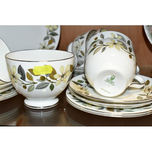 385 - A WEDGWOOD 'BEACONSFIELD' PATTERN TEA SET, comprising one cake plate, sugar bowl, milk jug, six cups... 