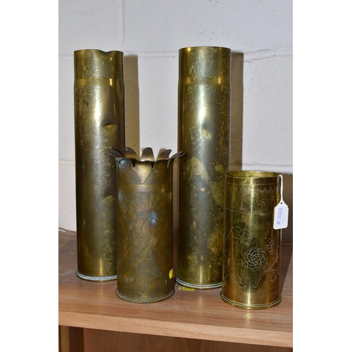 392 - A COLLECTION OF FOUR PIECES OF TRENCH ART, comprising two plain brass shell cases, height 35cm, a fl... 