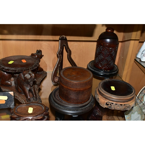 403 - A QUANTITY OF WOODEN VASE STANDS, comprising an Arts & Crafts style tobacco jar with carved detail, ... 