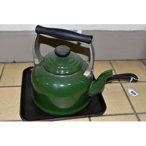 405 - A CAST IRON GRIDDLE PAN AND LE CREUSET KETTLE, a dark green 2.1 litre Le Creuset kettle suitable for... 