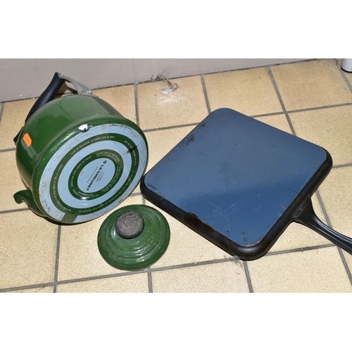 405 - A CAST IRON GRIDDLE PAN AND LE CREUSET KETTLE, a dark green 2.1 litre Le Creuset kettle suitable for... 