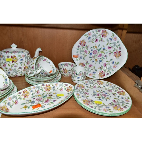 414 - A MINTON 'HADDON HALL 'PATTERN TEA SET, comprising three oval sandwich plates (two marked as second ... 