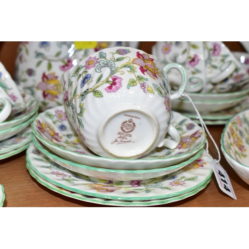 414 - A MINTON 'HADDON HALL 'PATTERN TEA SET, comprising three oval sandwich plates (two marked as second ... 