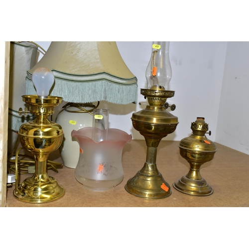 457 - ELEVEN ASSORTED TABLE LAMPS AND BRASS OIL LAMPS, including a reproduction Tiffany style leaded glass... 