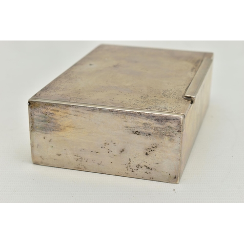 152 - A WHITE METAL CIGARETTE BOX, of a rectangular form, polished design, wooden interior, stamped to the... 