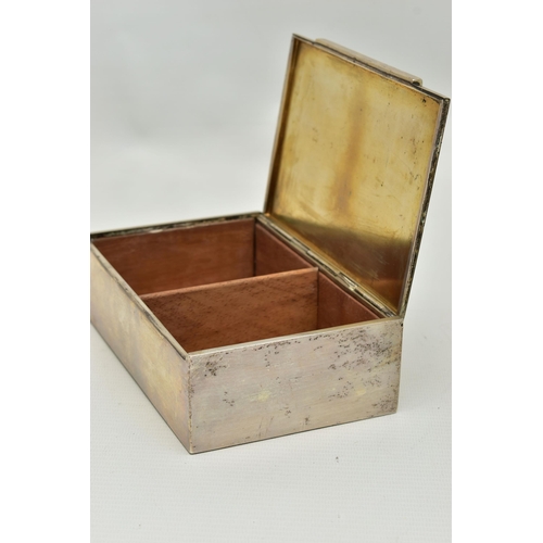 152 - A WHITE METAL CIGARETTE BOX, of a rectangular form, polished design, wooden interior, stamped to the... 