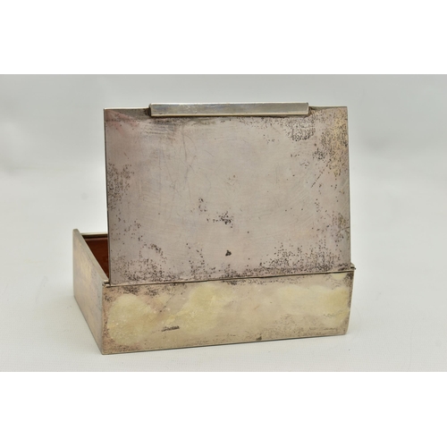 152 - A WHITE METAL CIGARETTE BOX, of a rectangular form, polished design, wooden interior, stamped to the... 