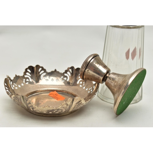 161 - A SILVER NUT DISH, SUGAR CASTER AND A CANDLESTICK, a  round dish with pierecd rasied rim, hallmarked... 