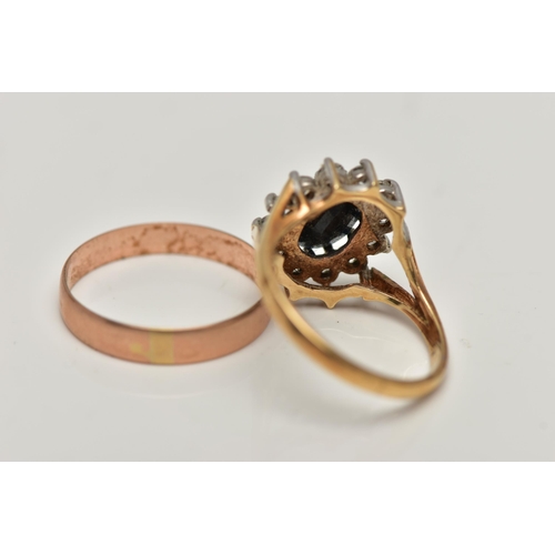 22 - TWO 9CT GOLD RINGS, the first an oval cluster ring, centring on a four claw set, oval cut deep blue ... 