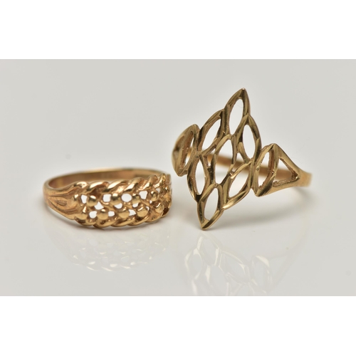 23 - TWO 9CT GOLD RINGS, the first of an openwork marquise form, bifurcated shoulders, leading onto a pol... 