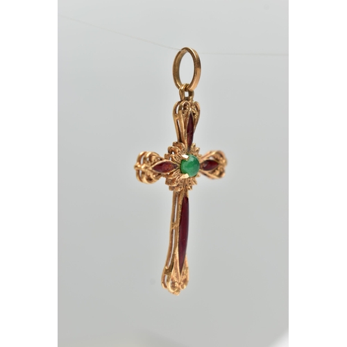 25 - A YELLOW METAL ENAMEL CROSS PENDANT, scroll detailed cross with red enamel, to the centre is a claw ... 