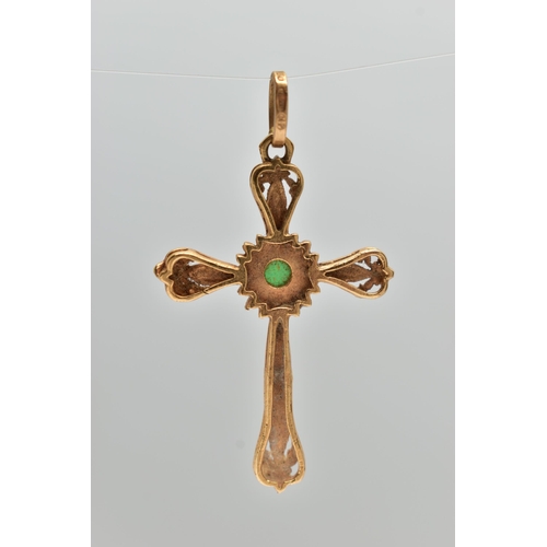 25 - A YELLOW METAL ENAMEL CROSS PENDANT, scroll detailed cross with red enamel, to the centre is a claw ... 