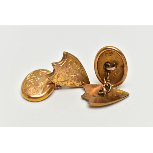 33 - A PAIR OF EARLY 20TH CENTURY 9CT GOLD CUFFLINKS, each cufflink designed with an oval and a shield sh... 