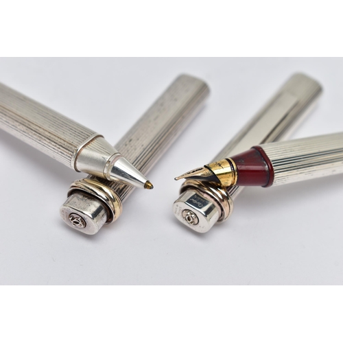 40 - A PAIR OF 'CARTIER' LES DE MUST VENDOME TRINITY PENS, a fountain pen, bugandy resin, silver tone cas... 