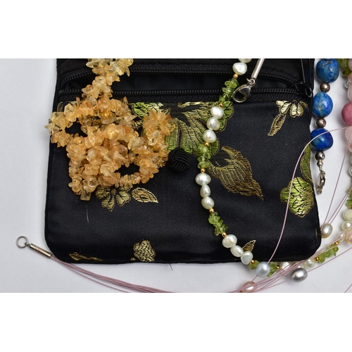 56 - A BAG OF ASSORTED SEMI-PRECIOUS GEMSTONE JEWELLERY, to include five long strands of baroque cultured... 