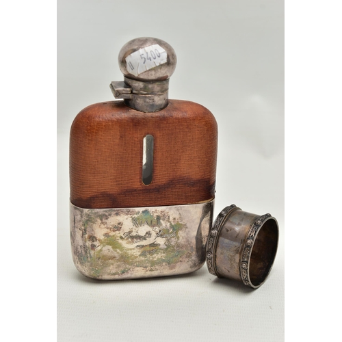 86 - A HIPFLASK AND A SILVER NAPKIN RING, the EPBM 1/4 Pt, glass hipflask with cup, engraved 'Niall From ... 