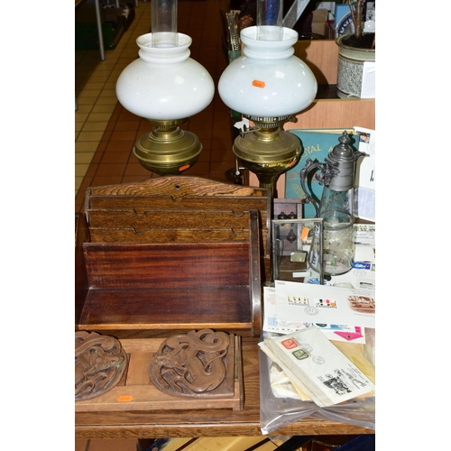 433 - A GROUP OF OIL LAMPS, SMALL STAMP COLLECTION AND WOODEN BOOK STANDS, comprising an Oriental carved b... 