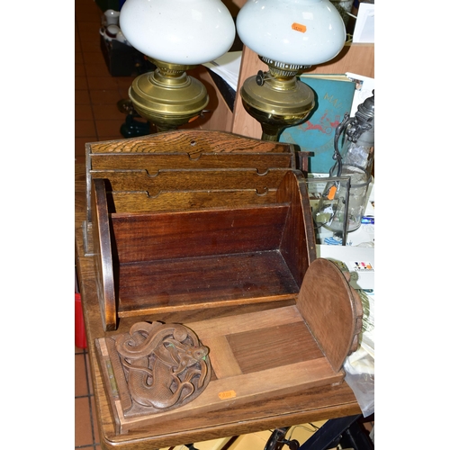 433 - A GROUP OF OIL LAMPS, SMALL STAMP COLLECTION AND WOODEN BOOK STANDS, comprising an Oriental carved b... 