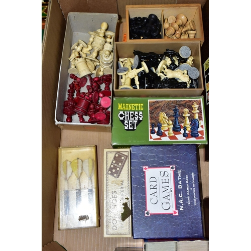 438 - A BOX OF ASSORTED CHESS SETS, PLAYING CARDS AND DOMINOS,  to include two unused sets of Bridge playi... 