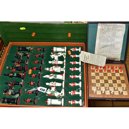 438 - A BOX OF ASSORTED CHESS SETS, PLAYING CARDS AND DOMINOS,  to include two unused sets of Bridge playi... 