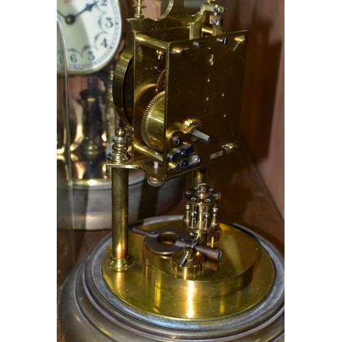 430 - TWO BRASS ANNIVERSARY CLOCKS, comprising one with a glass dome mechanism marked 72632, with key (gla... 