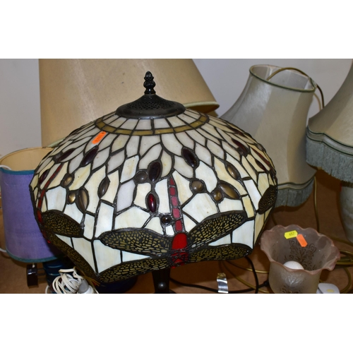 457 - ELEVEN ASSORTED TABLE LAMPS AND BRASS OIL LAMPS, including a reproduction Tiffany style leaded glass... 