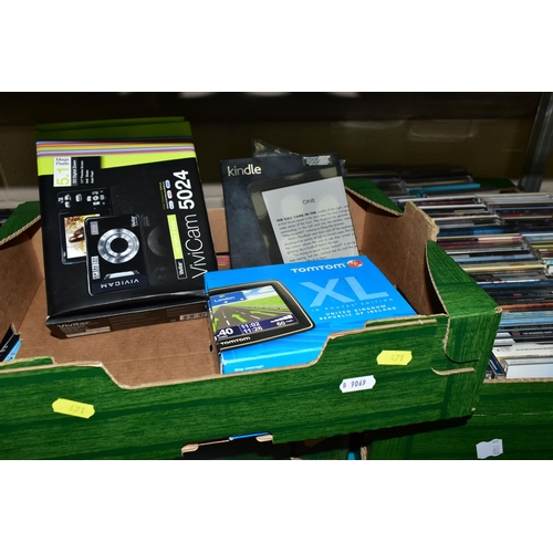 471 - THREE BOXES OF CDS, DVDS AND KINDLE,  to include a boxed Amazon Kindle model No.WP63GW, a boxed Vivi... 