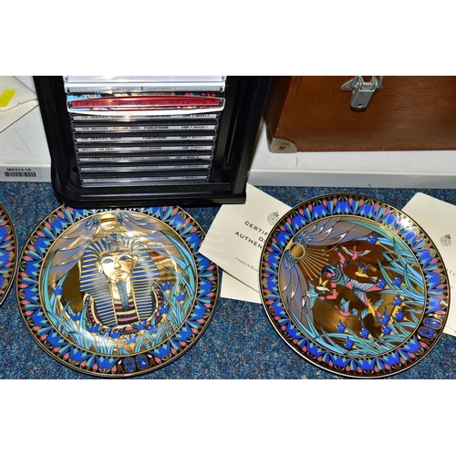 544 - NINETEEN COLLECTORS PLATES, A SMALL RACK OF BEATLES CDS AND TWO WOODEN BOXES, the collectors plates ... 
