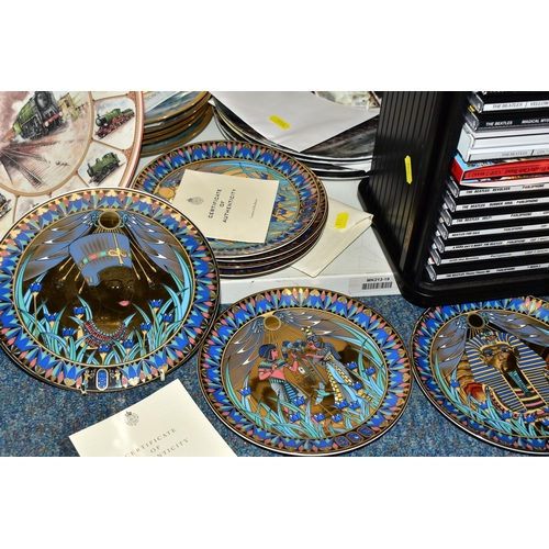 544 - NINETEEN COLLECTORS PLATES, A SMALL RACK OF BEATLES CDS AND TWO WOODEN BOXES, the collectors plates ... 