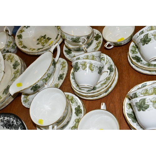 551 - A ROYAL WORCESTER HOP 'MATHON' PATTERN DINNER SERVICE,  comprising a pair of oval serving dishes, a ... 
