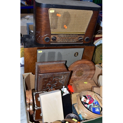 562 - A QUANTITY OF TREEN, WICKER BASKETS, ETC, including two vintage wooden cased radios by Invicta and P... 
