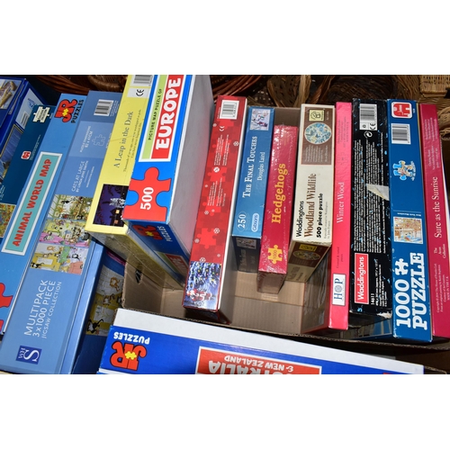 570 - THREE BOXES OF JIGSAW PUZZLES, comprising twenty-four 500pc or 1000pc assorted boxed puzzles - conte... 