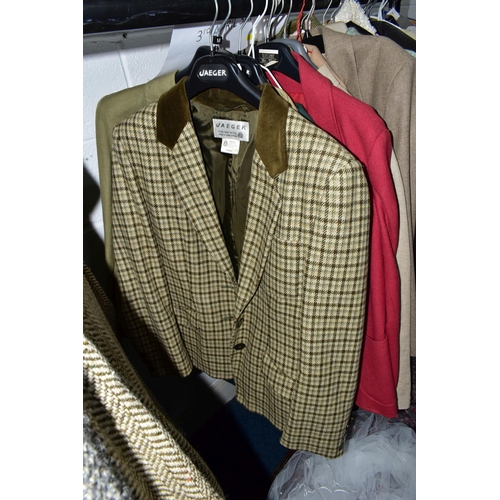 575 - A RAIL AND TWO BOXES OF LADIES CLOTHING, to include coats, jackets, faux furs, sheepskins, skirts an... 