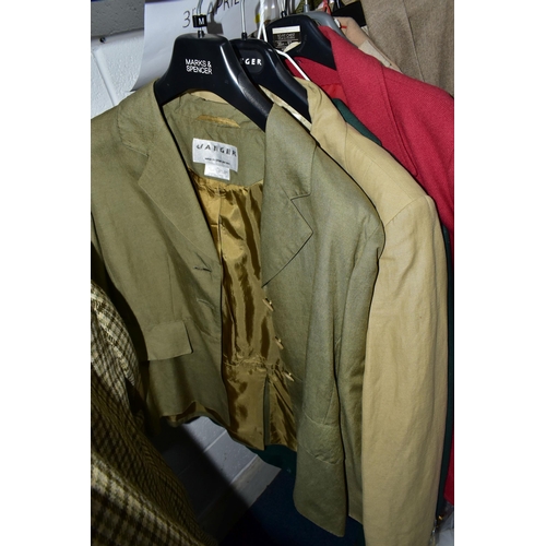 575 - A RAIL AND TWO BOXES OF LADIES CLOTHING, to include coats, jackets, faux furs, sheepskins, skirts an... 