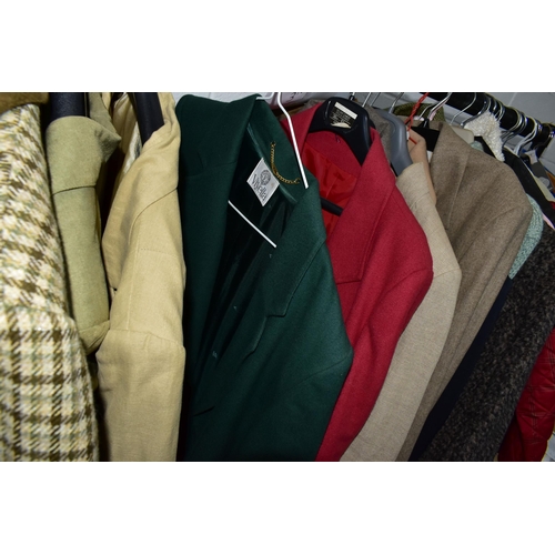 575 - A RAIL AND TWO BOXES OF LADIES CLOTHING, to include coats, jackets, faux furs, sheepskins, skirts an... 